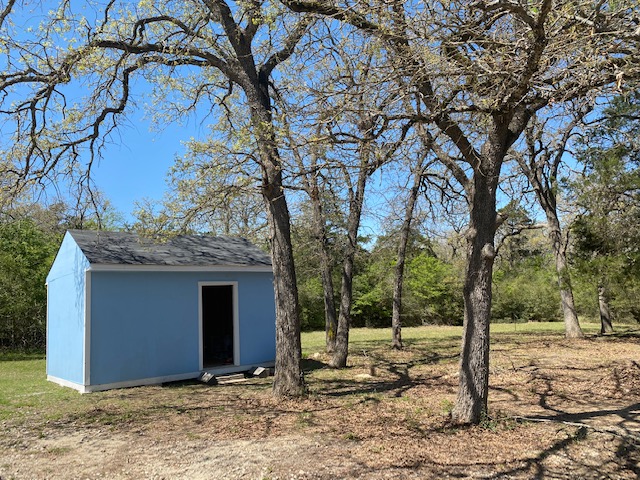 Light blue cabin outside front